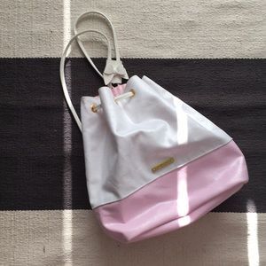 Juicy Couture pink/white backpack.